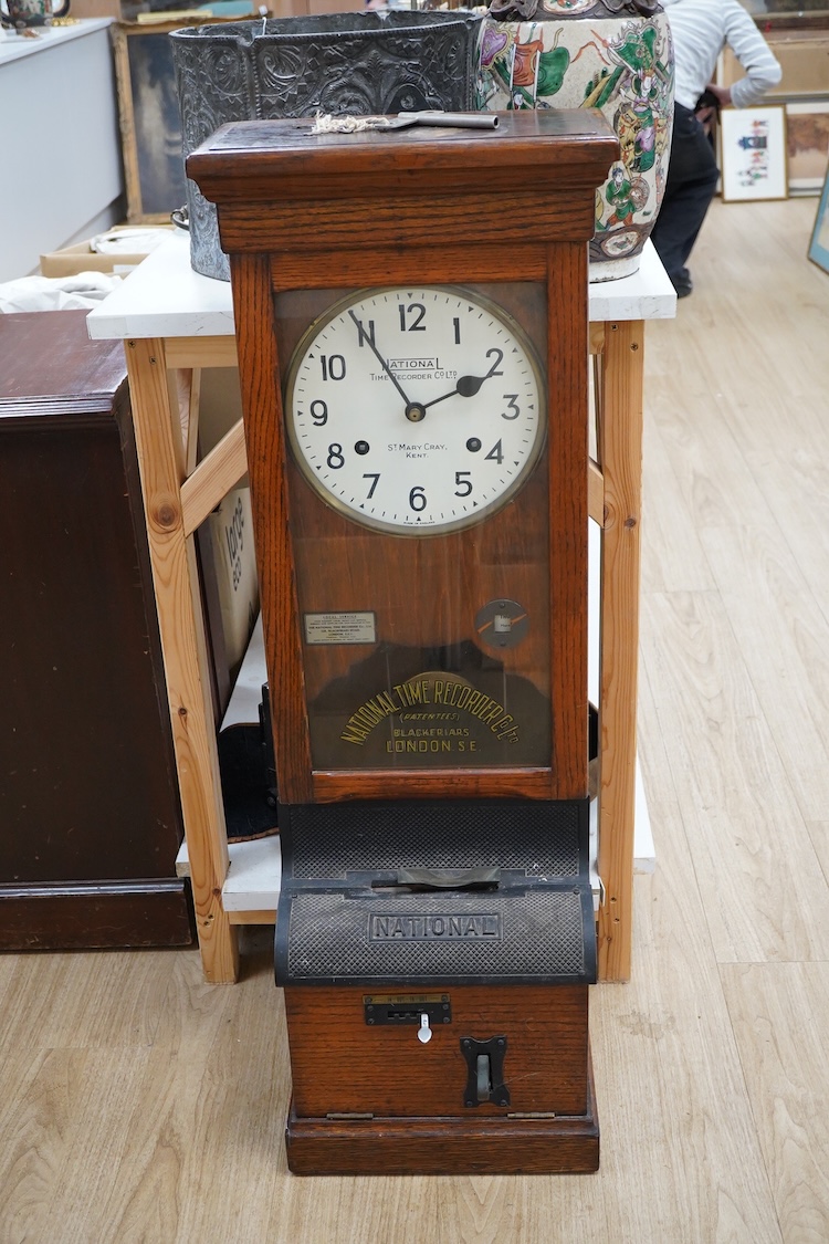 A National Time Recorder Co. Ltd. clocking in clock, 109cm high